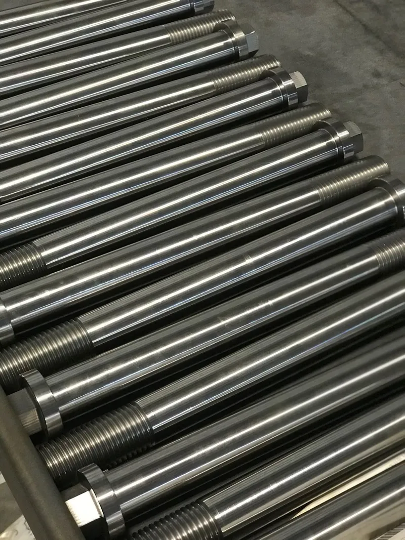 1-1/4"-8 UN x 12" Hexagon Flange Bolts in ASTM A193 B7 — machined by Innovation Fasteners, Houston (photo 2 of 3)
