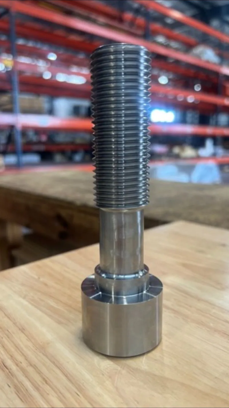 1-1/4"-8 UNJ-2A x 5" Socket Head Cap Screw in ASTM F593 Group 7 17-4 PH stainless (UNS S17400) — machined by Innovation Fasteners, Houston