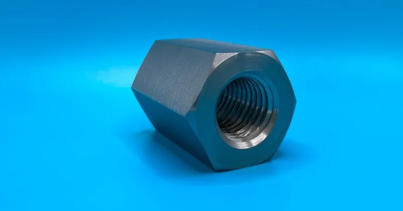 1-1/8"-7 UN-2B x 2-1/2" Hex Coupling Nut in ASTM A194 Grade 2H, clear zinc — machined by Innovation Fasteners, Houston