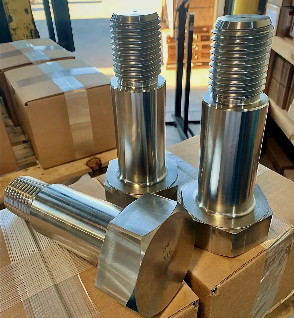 2-1/4" x 4-1/2" Hex Shoulder Bolts in 316 Stainless Steel — machined by Innovation Fasteners, Houston