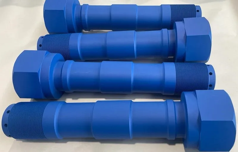 2-3/4"-12 UN-3A x 15-5/8" Custom Bolt in ASTM A320 L43, Xylan 1424 Blue coating — machined by Innovation Fasteners, Houston