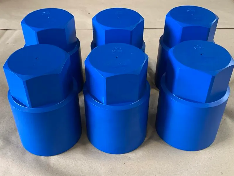 3-1/2"-8 UN-3B Hexagon Cap Nuts in ASTM A194 2H, Xylan 1424 coated — machined by Innovation Fasteners, Houston