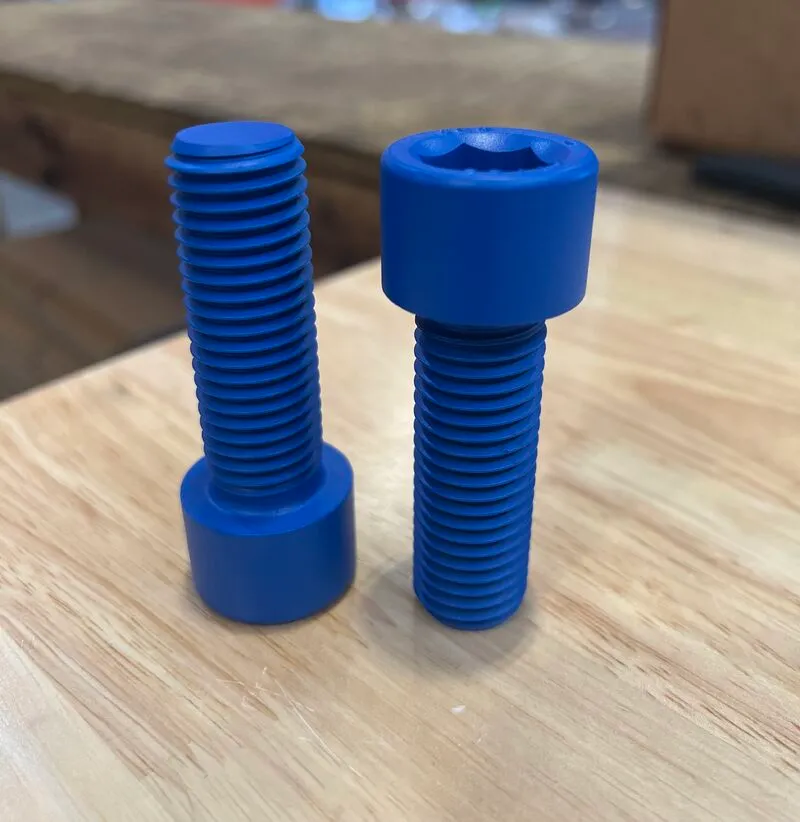 3/4"-10 UNC-2A x 2-1/4" Socket Head Cap Screw in ASTM A193 Grade B7, Xylan 1424 Blue coating — machined by Innovation Fasteners, Houston (photo 2 of 3)