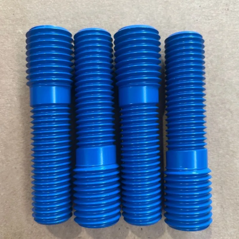 7/8-9 x 3/4-10 UNC-2A x 3.4995" Step Stud in ASTM A193 B7, blue PTFE — machined by Innovation Fasteners, Houston