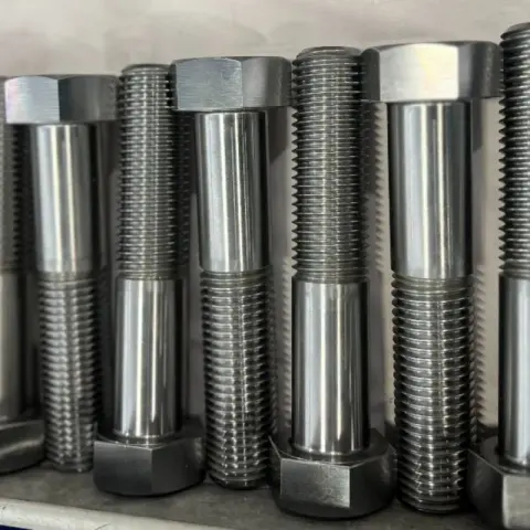 1-1/4-7 UNC-2A x 6-1/4" Hex Head Cap Screw in ASTM A320 L7 — machined by Innovation Fasteners, Houston
