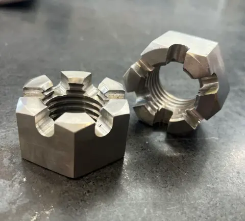 1-3/8-6 UNC-2B Hex Slotted Nut in ASTM A194 Grade 8 — machined by Innovation Fasteners, Houston