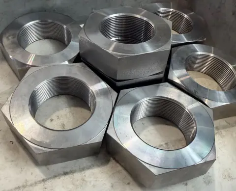 2-1/4"-12 UN-2B Heavy Hex Jam Nut in ASTM A194 Grade 2H — machined by Innovation Fasteners, Houston